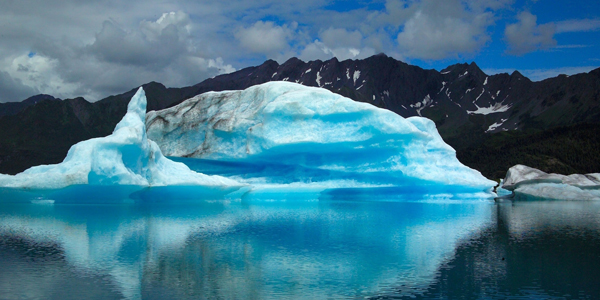 an iceberg floating in the ocean